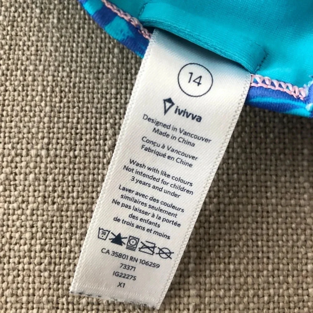 Lululemon Ivivva Girls Size 14 Turquoise Racerback Sports Bra Zebra Animal Print
